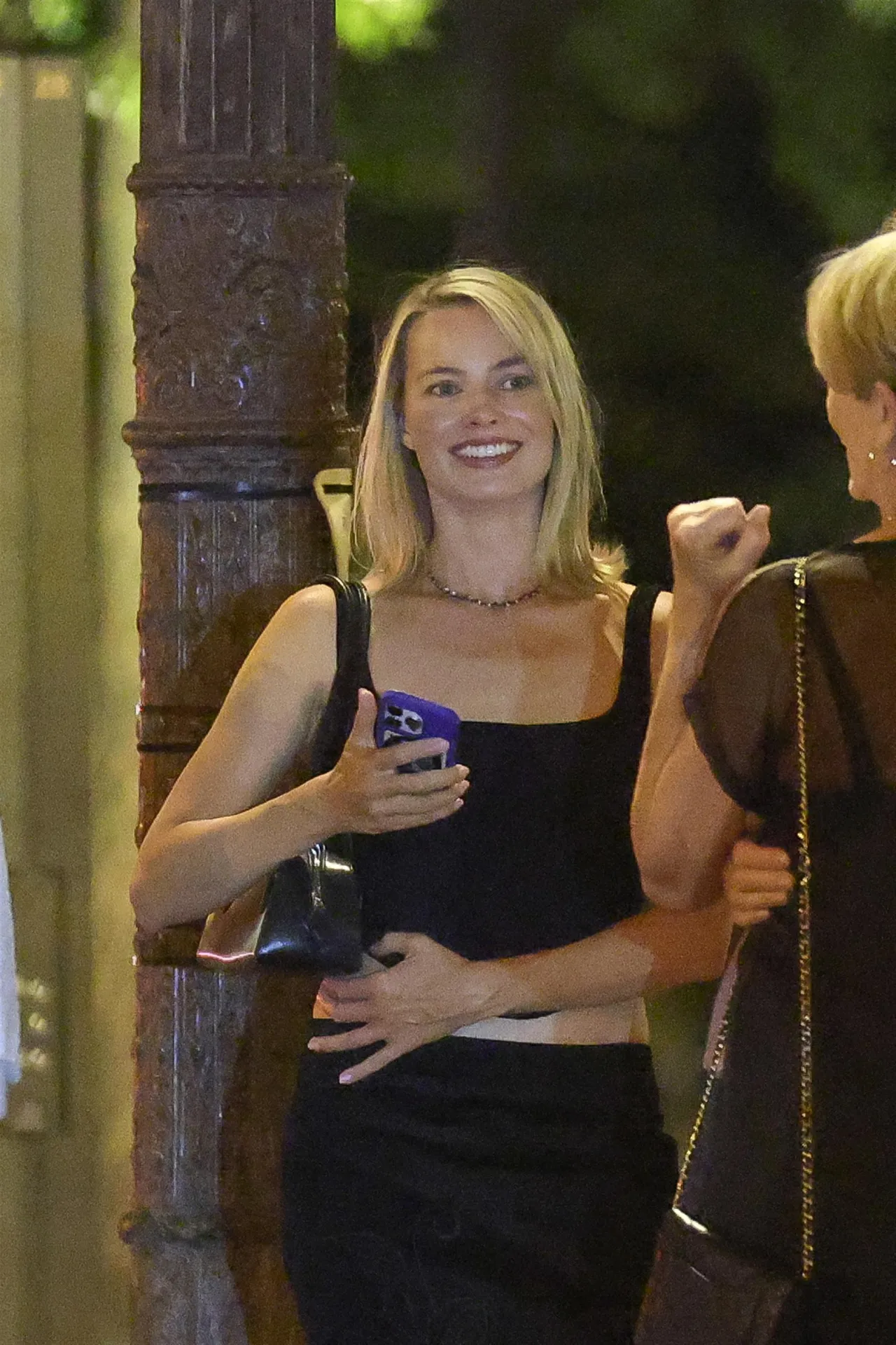 Margot Robbie Black Midi Skirt Look in Paris – August 15, 2026