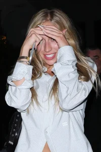 Tate McRae Wears an Oversized Pinstripe Shirt and Mini Skirt at Chateau Marmont 25 Tate McRae Wears an Oversized Pinstripe Shirt and Mini Skirt at Chateau Marmont