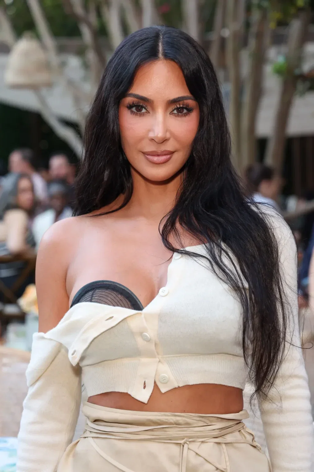 Kim Kardashian Builds a Formal Evening Look Around Deliberately Undone Knitwear